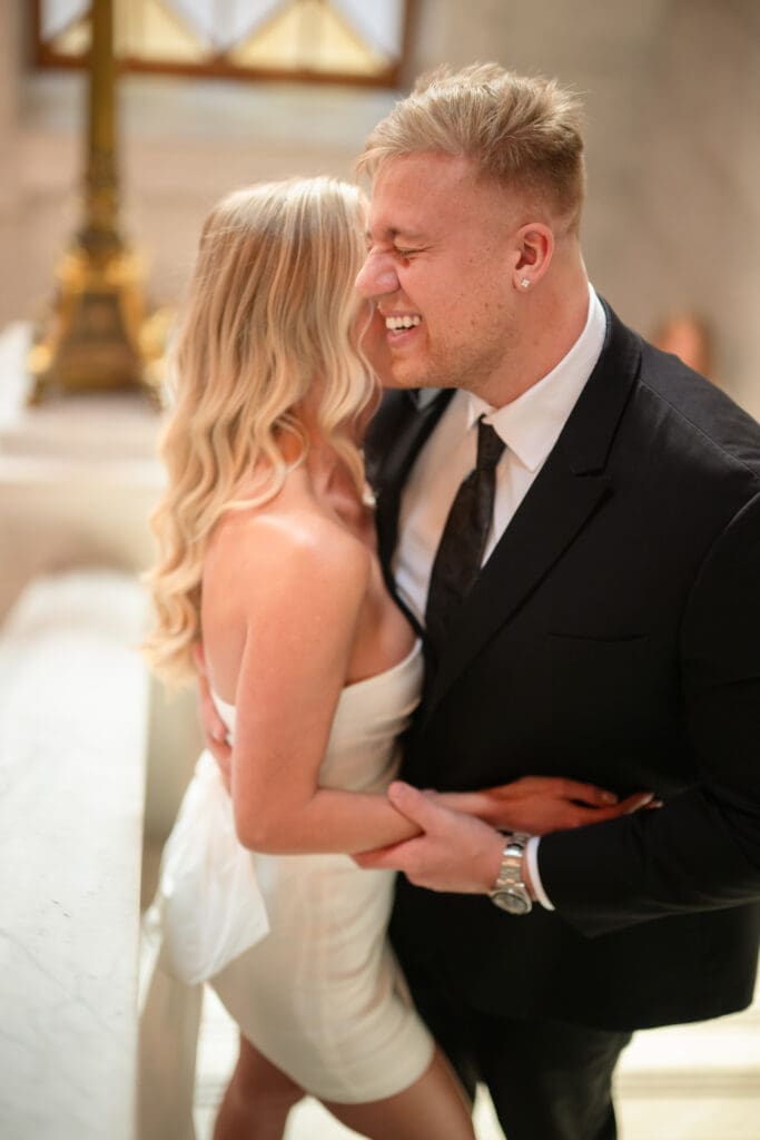 Editorial-style engagement portraits at The Ohio Statehouse