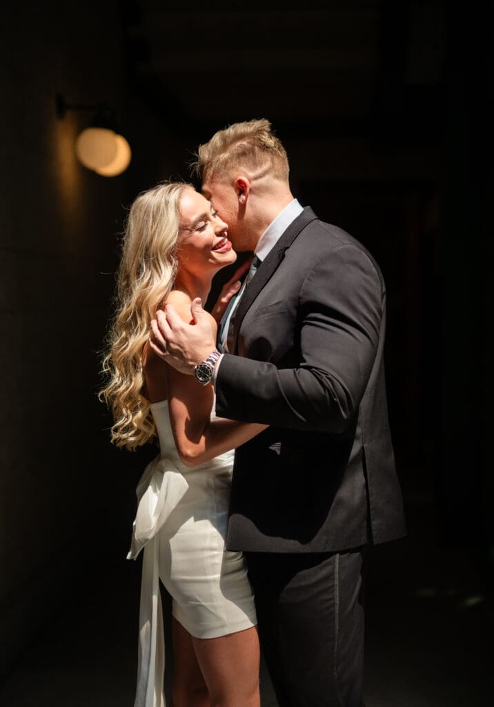 Moment of laughter shared between the couple during romantic ohio statehouse engagement session