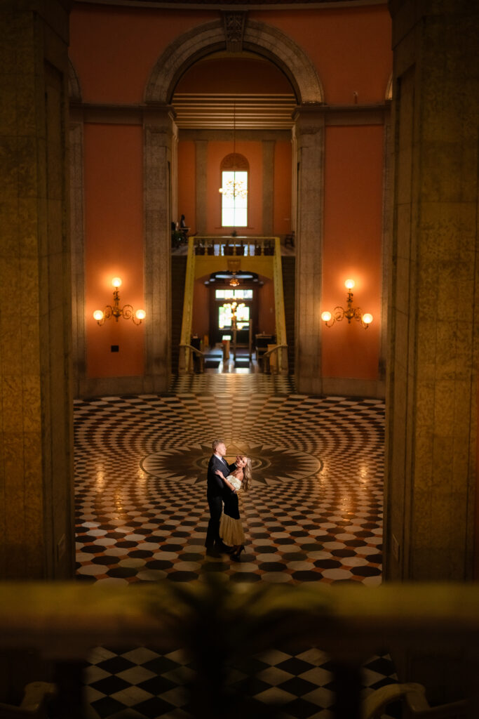 Dramatic portrait of couple dancing in the rotunda of The Ohio Statehouse