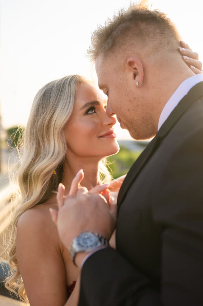 Bride and groom sharing a quiet moment with historic Columbus in the background