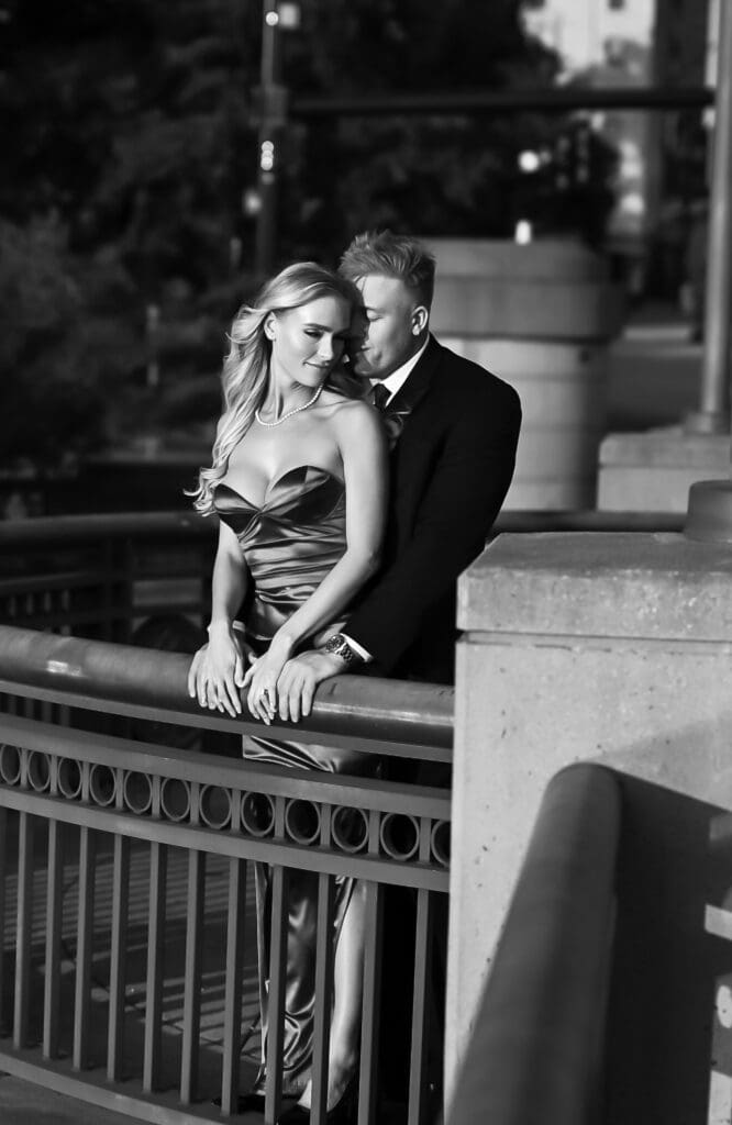 black and white editorial photo during golden hour downtown columbus on bridge