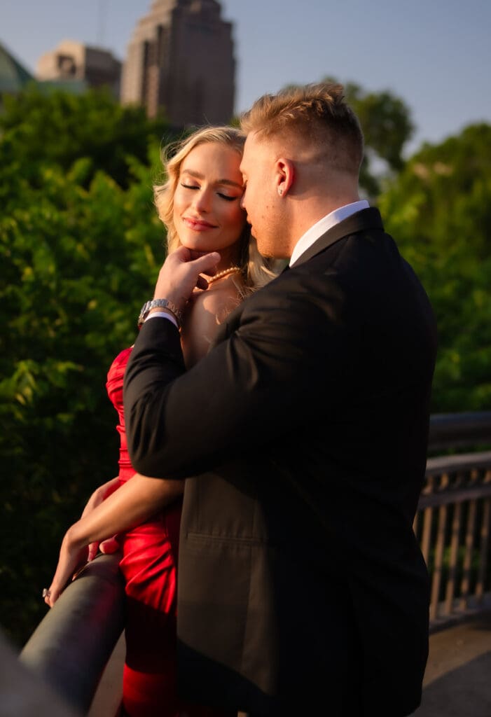 bride and groom romance during downtown Columbus engagement session