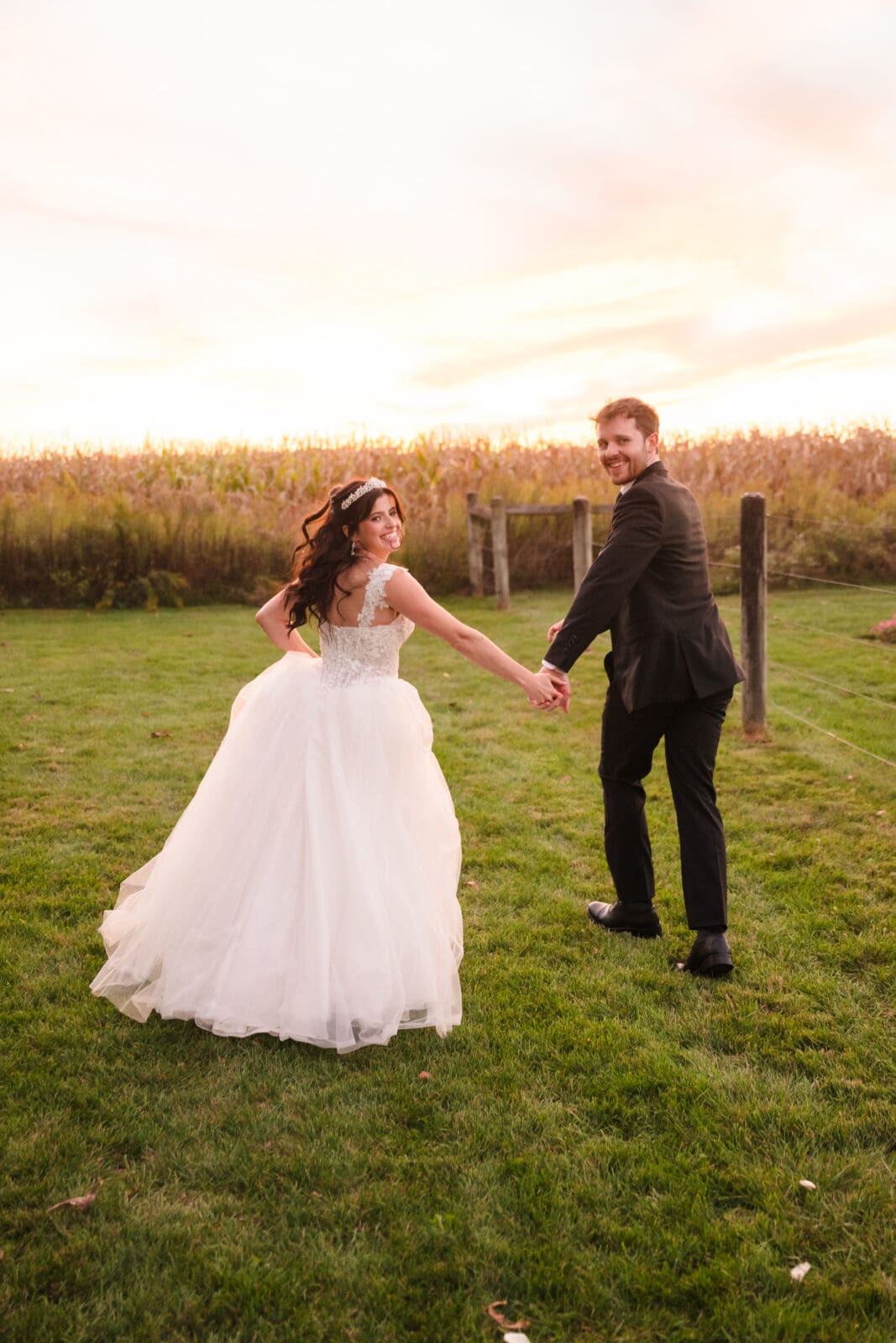 Romantic wedding portraits at Aspen & Alston with natural and elegant style couple looking over shoulder