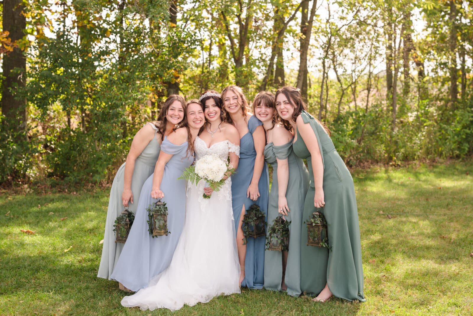 Romantic garden party wedding at Aspen & Alston venue in Ohio bridesmaids together 
