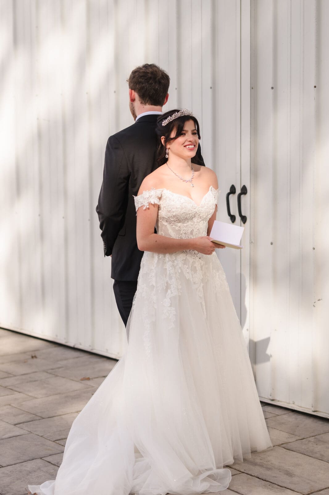 Heartfelt wedding moments at Aspen & Alston during romantic garden party celebration couple reading private vows