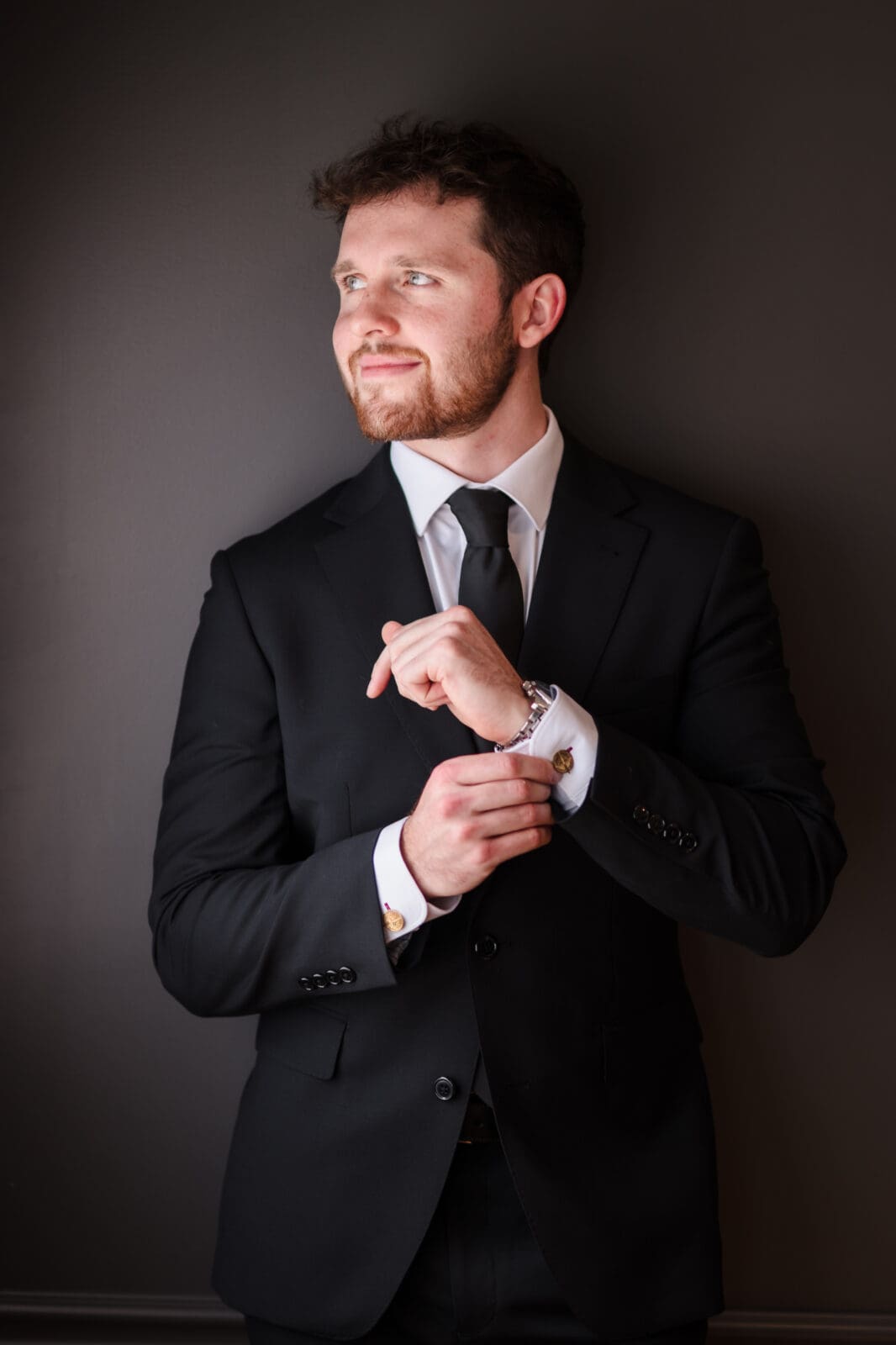 groom portrait with window light at Aspen and Alston wedding