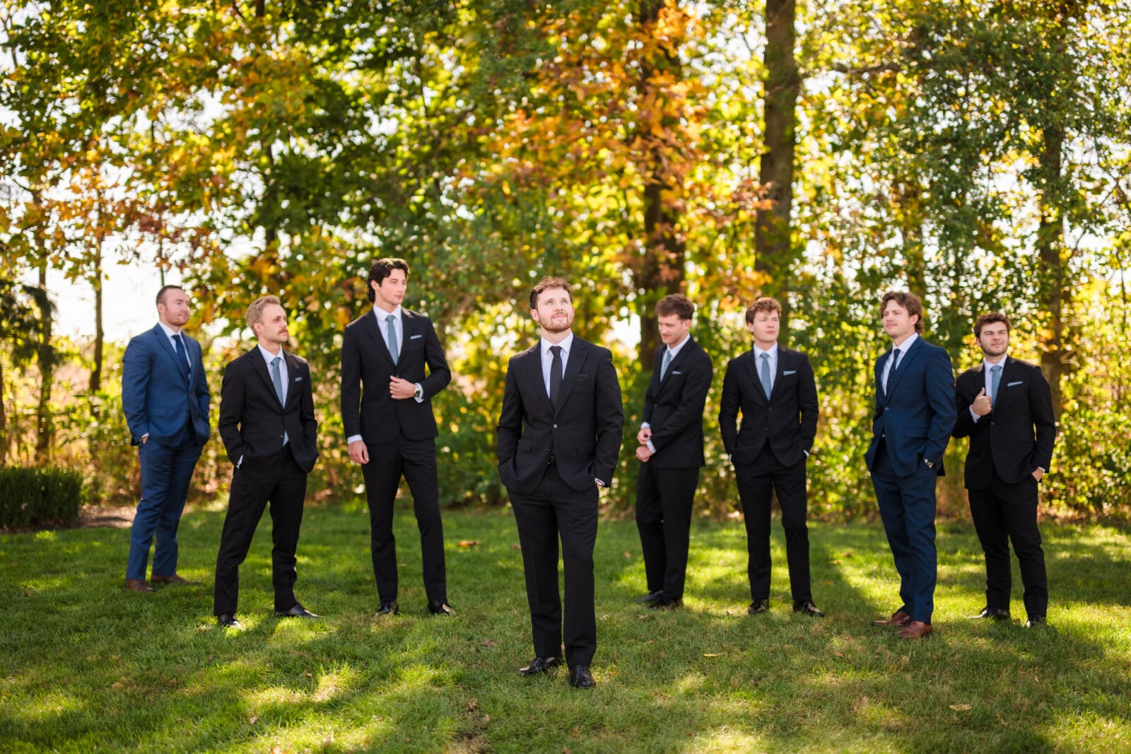 Romantic Aspen & Alston wedding with elegant garden party aesthetic groomsmen posed group 