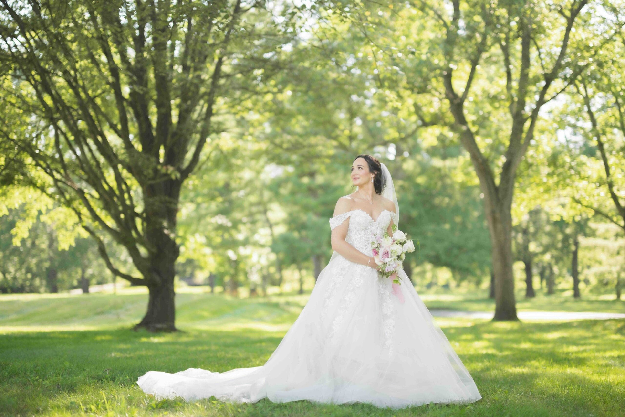 bride posing for portrait outside Darby House Venue