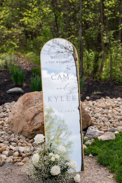 Welcome mirror sign guests see before entering ceremony space at Retreat 21