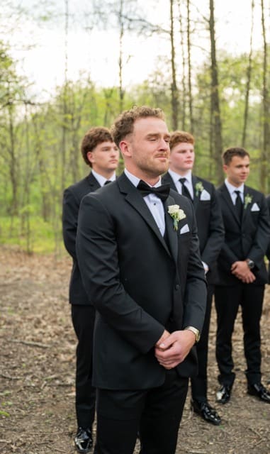Groom crying as he sees bride walk down the aisle at Retreat 21 wedding 